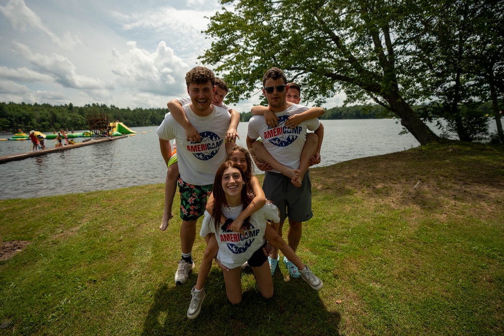 Americamp Group of counsellors by lake