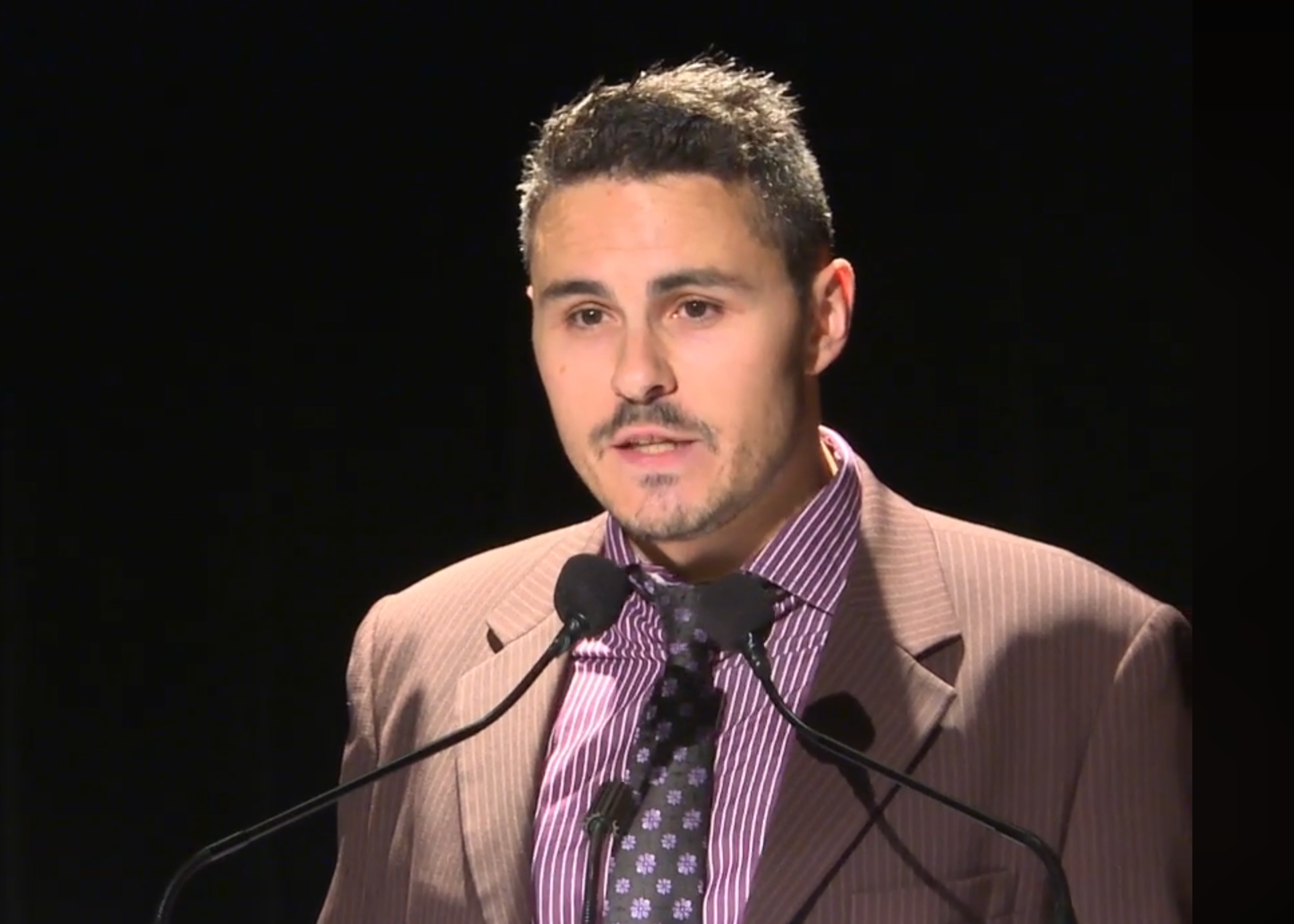 Syril Tiar delivering a digital marketing training speech at a business conference