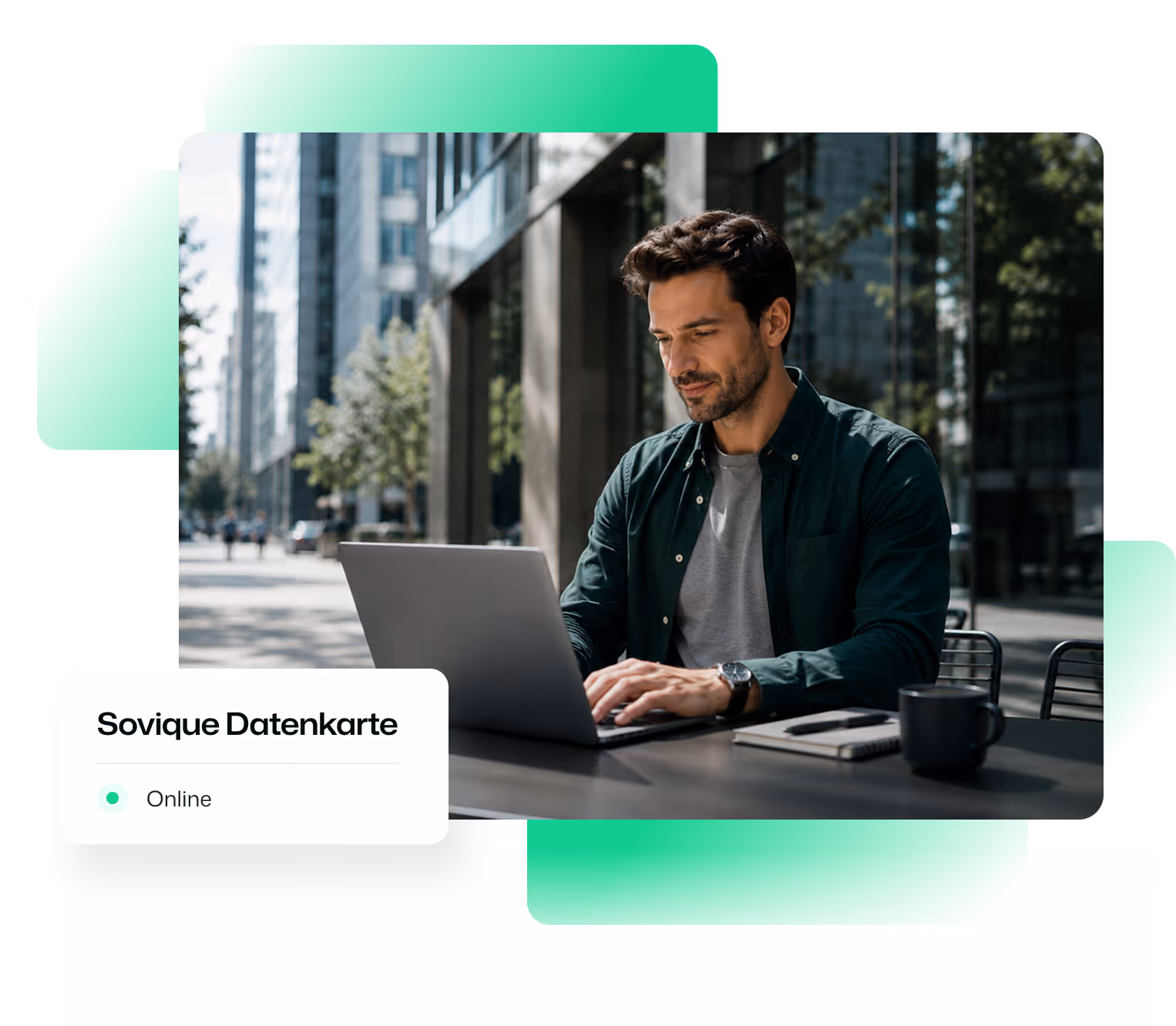 Man in dark green shirt working on laptop outside at table with coffee and notebook.