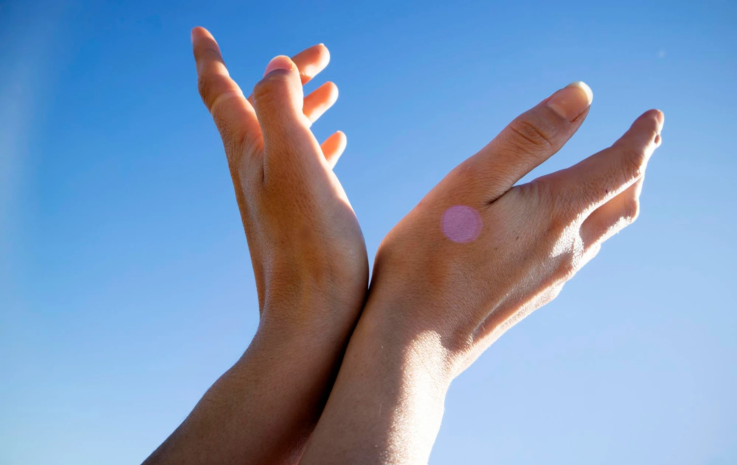 Clean dermatology concept showing hands