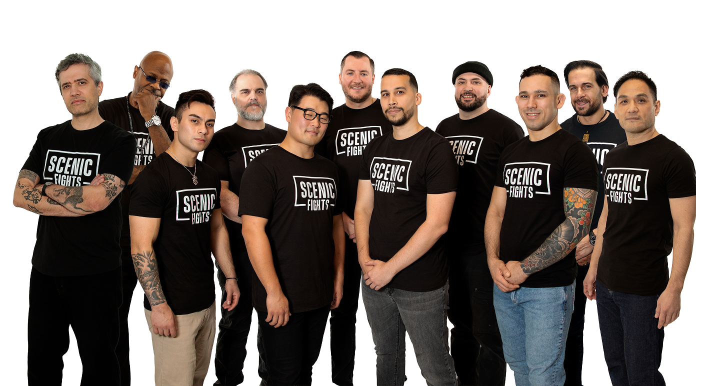 Group of eleven men standing side by side wearing black Scenic Fights t-shirts.