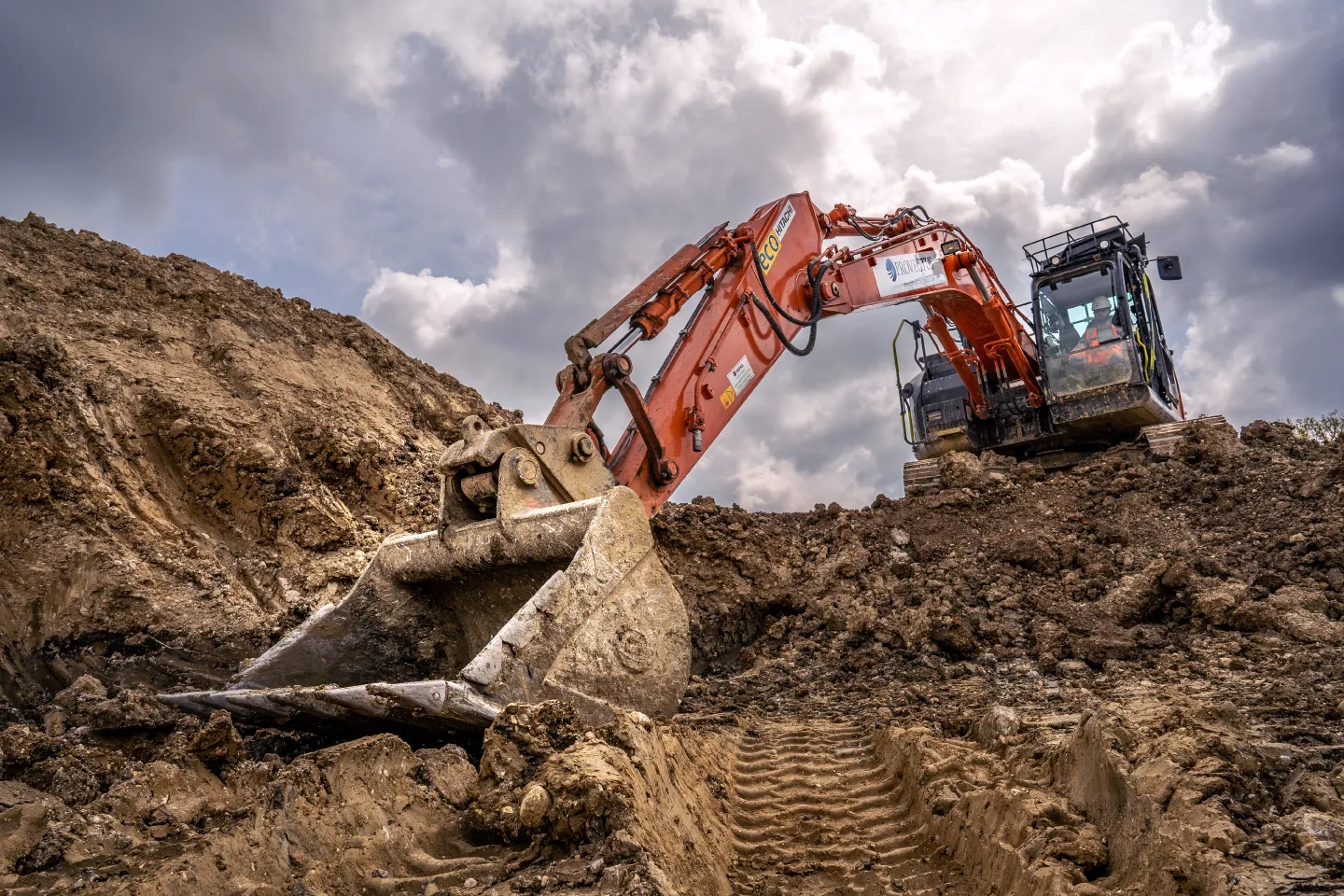 Digger working in land