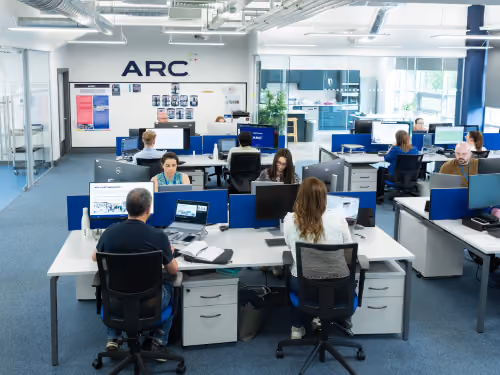 [background image] image of a workplace setting (for an ai healthcare company)