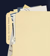 A stack of mostly beige folders and papers with text on one visible tab against a dark background.