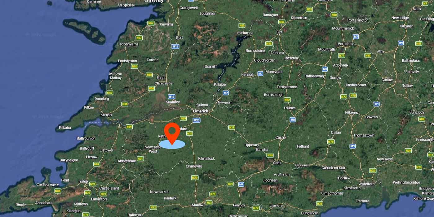 Map of southwestern Ireland showing towns and roads with a red location marker near Newcastle West, Limerick.