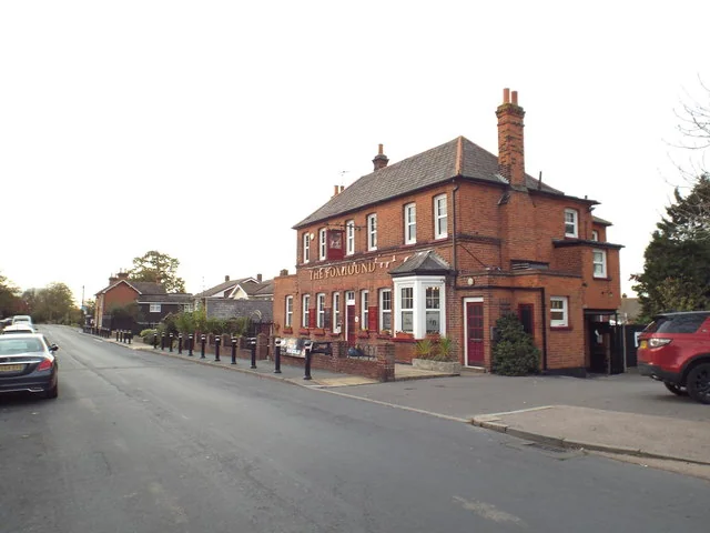 The Foxhound pub, a red brick building on the village road in Orsett