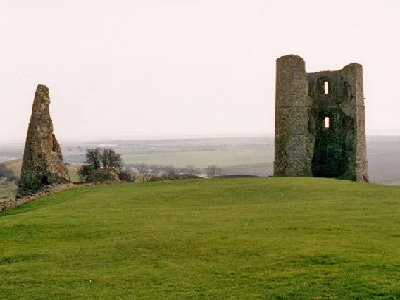 Ruined towers of Hadleigh Castle on the hillside overlooking the estuary