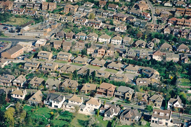 Aerial view of family homes and gardens on the residential streets of Benfleet