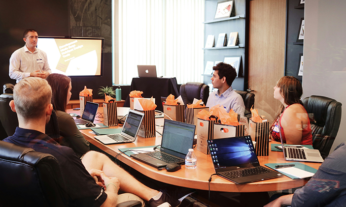Team meeting reviewing a campaign