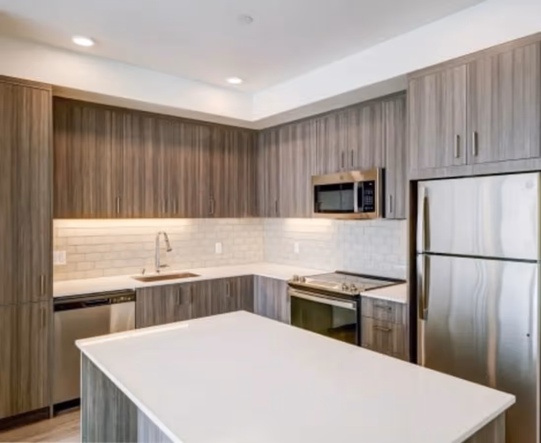 Kitchen with brown cabinets 