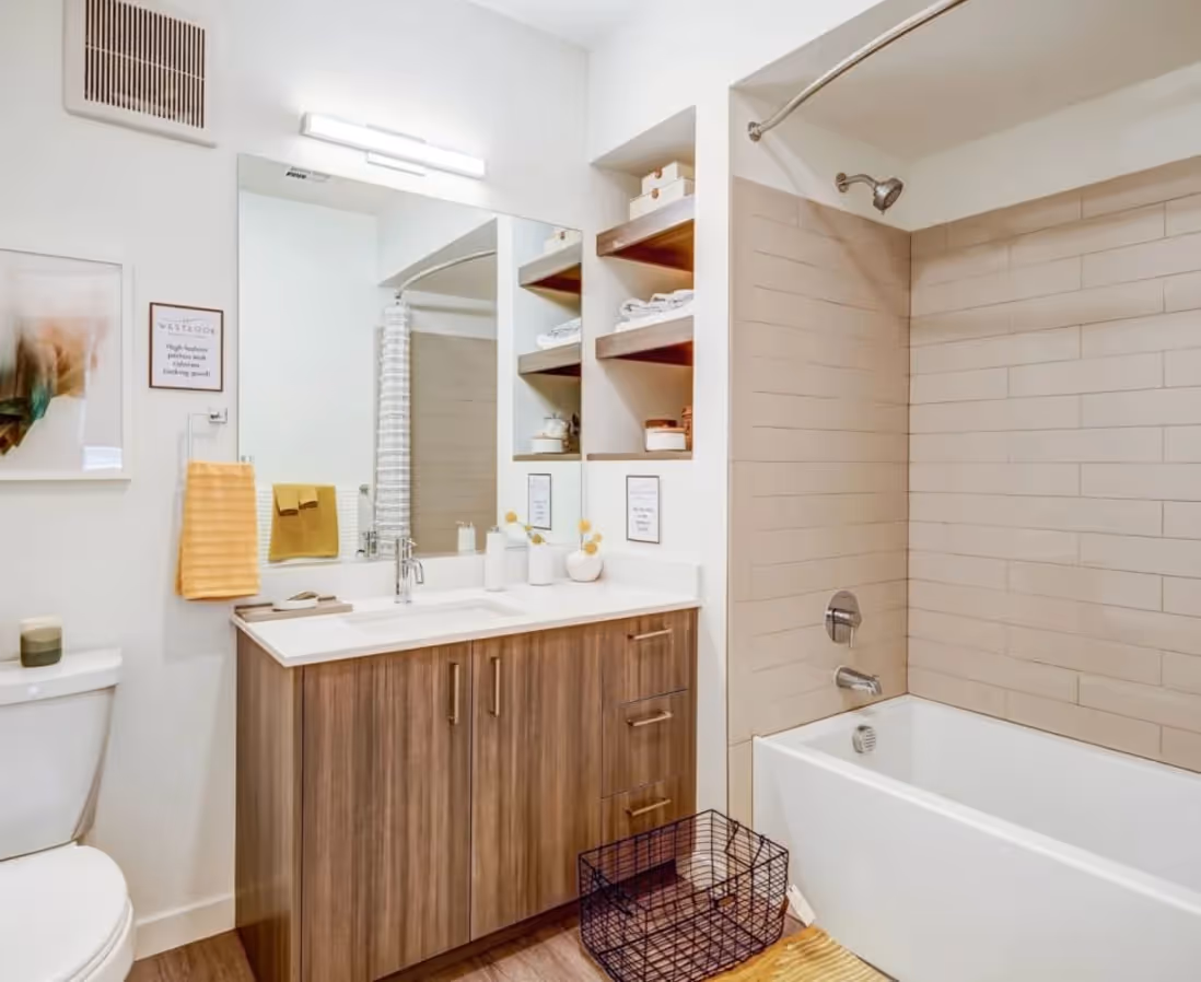 Bathroom with brown cabinets