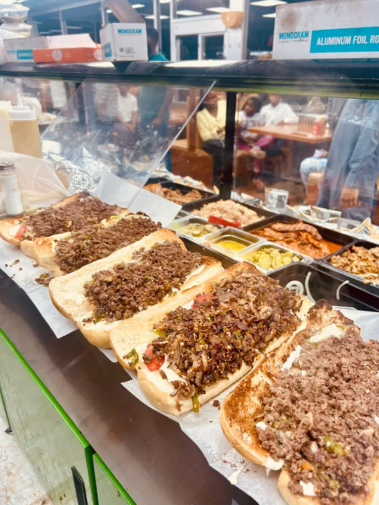 Several sandwiches opened showing the meat