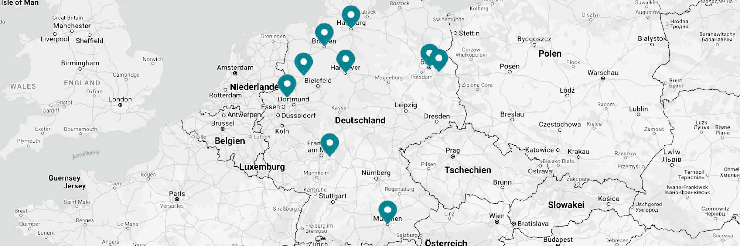 Map of Germany and surrounding countries in Europe with blue map markers on Hamburg, Bremen, Hanover, Dortmund, Frankfurt am Main, Berlin area, and Munich.