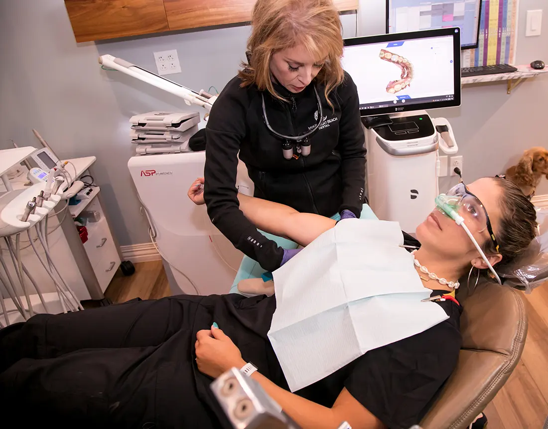 Dr. Nicole Vane with dental patient 