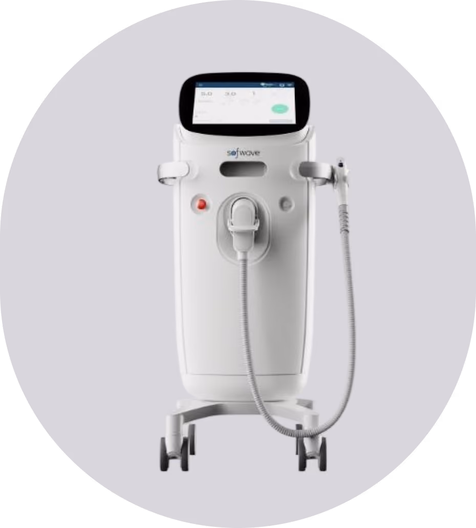 Modern white medical device on wheels with a touchscreen displaying controls and a handheld applicator attached by a flexible cable.