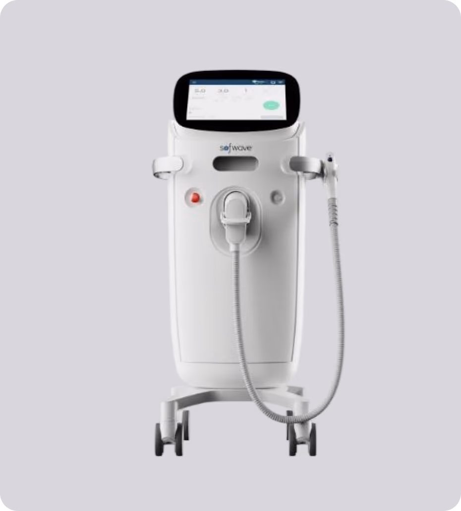 Modern white medical device on wheels with a touchscreen displaying controls and a handheld applicator attached by a flexible cable.