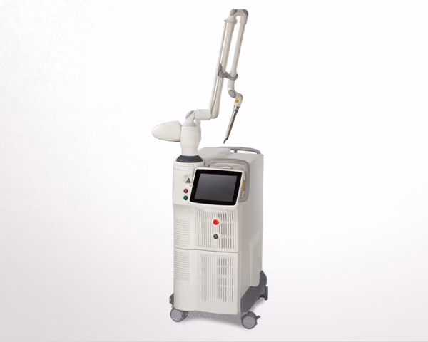 White medical laser machine with a touchscreen display and articulated arm on wheels against a white background.