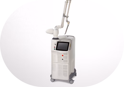 Medical-grade laser machine with a touchscreen and articulated arm on wheels, used for dermatological or cosmetic procedures.
