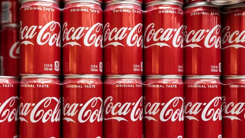 Pallet of stacked Coca-Cola cans