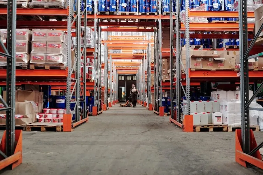 Palletized warehouse aisle with stacked boxes