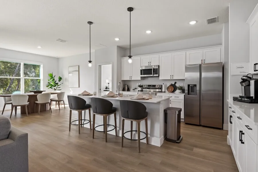 Estela Living modern kitchen with island and bar stools