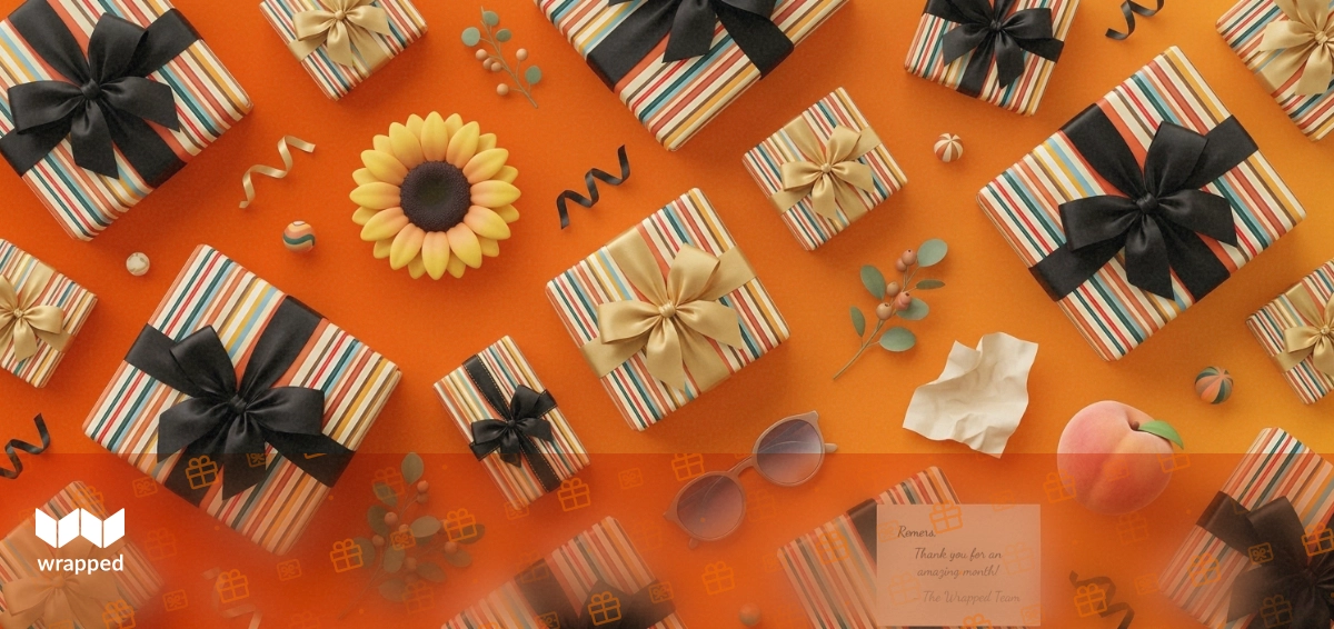 A handwritten thank-you note tucked inside a gift box surrounded by wrapped presents on a table