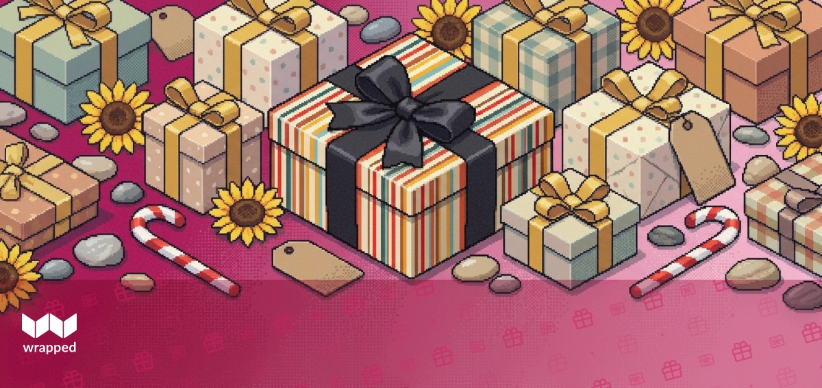 Gift boxes wrapped in paper with cards and ribbon arranged on a table ready to be sent