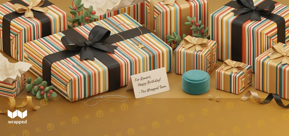 Gold necklace, silver bracelet and star stud earrings arranged beside a velvet box and a handwritten gift card