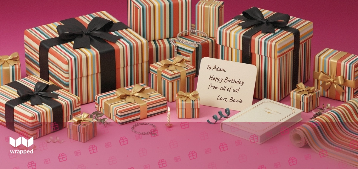 Editorial still life with a handwritten card, silver bracelet, birthday candle, book and striped wrapping paper in warm rose tones