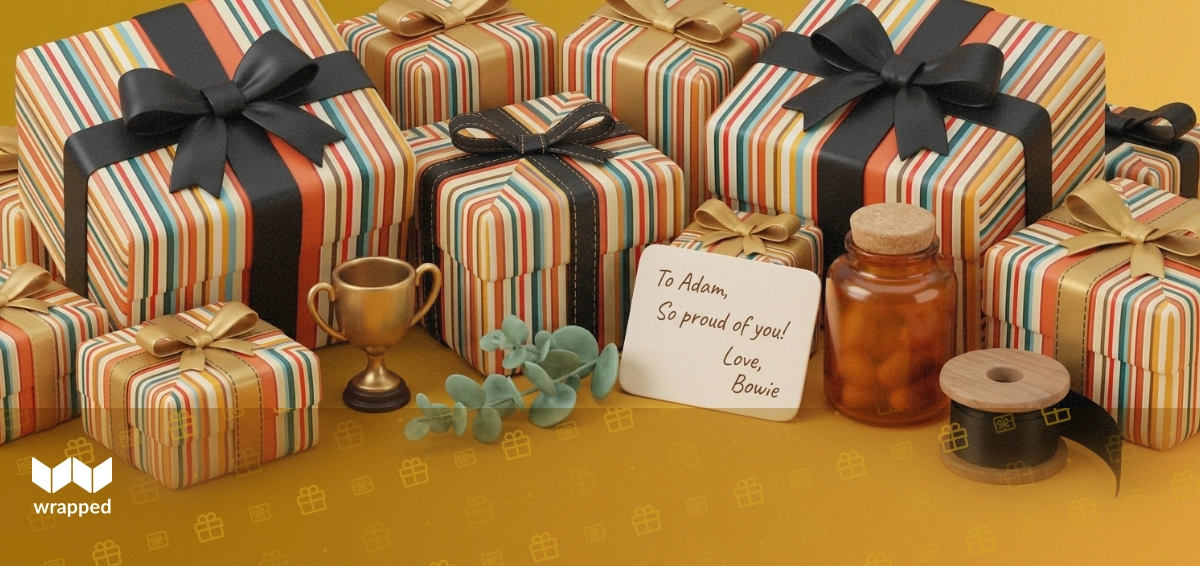 Editorial still life with a handwritten message card, small brass trophy charm, eucalyptus sprig and ribbon spool in warm golden light