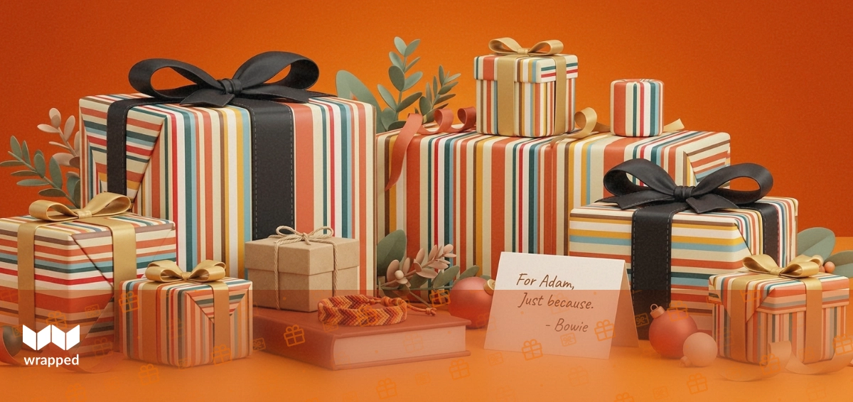 Warm amber still life with a hardcover book, handwritten message card, friendship bracelet and small kraft gift box