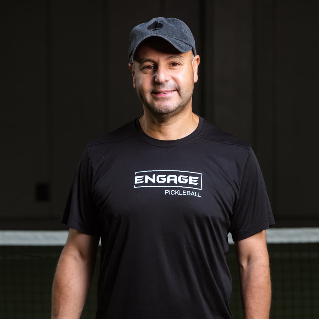 Profile picture of Youssef Bouzidi wearing a black Atlantic City Aces hat and a black Engage Pickleball t-shirt.