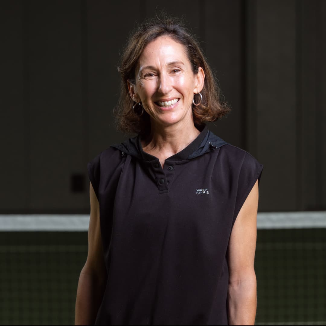 Profile picture of Natalia Garcia Miller wearing a black sleeveless polo. 