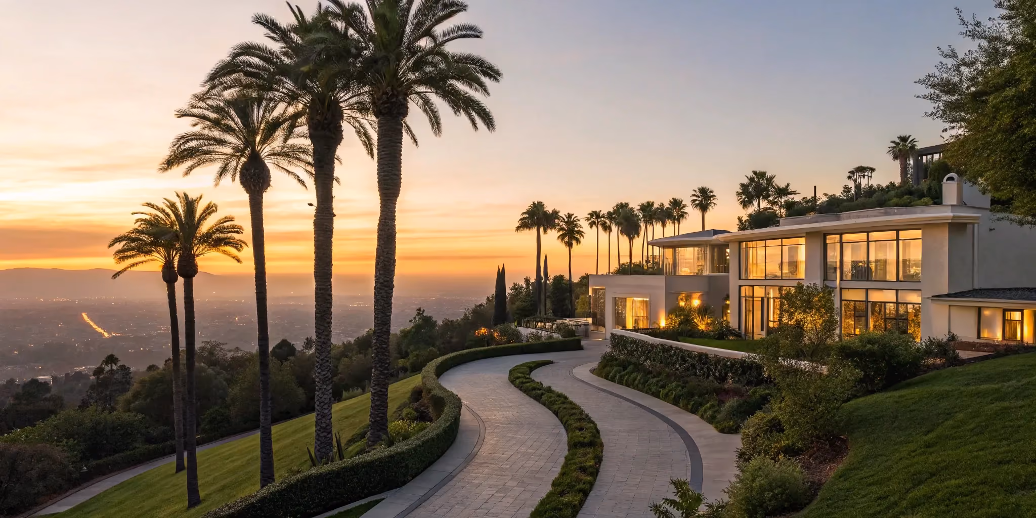 A luxury custom home with large windows, a factor in how much it costs to build.