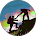 A person helping another person up a hill.