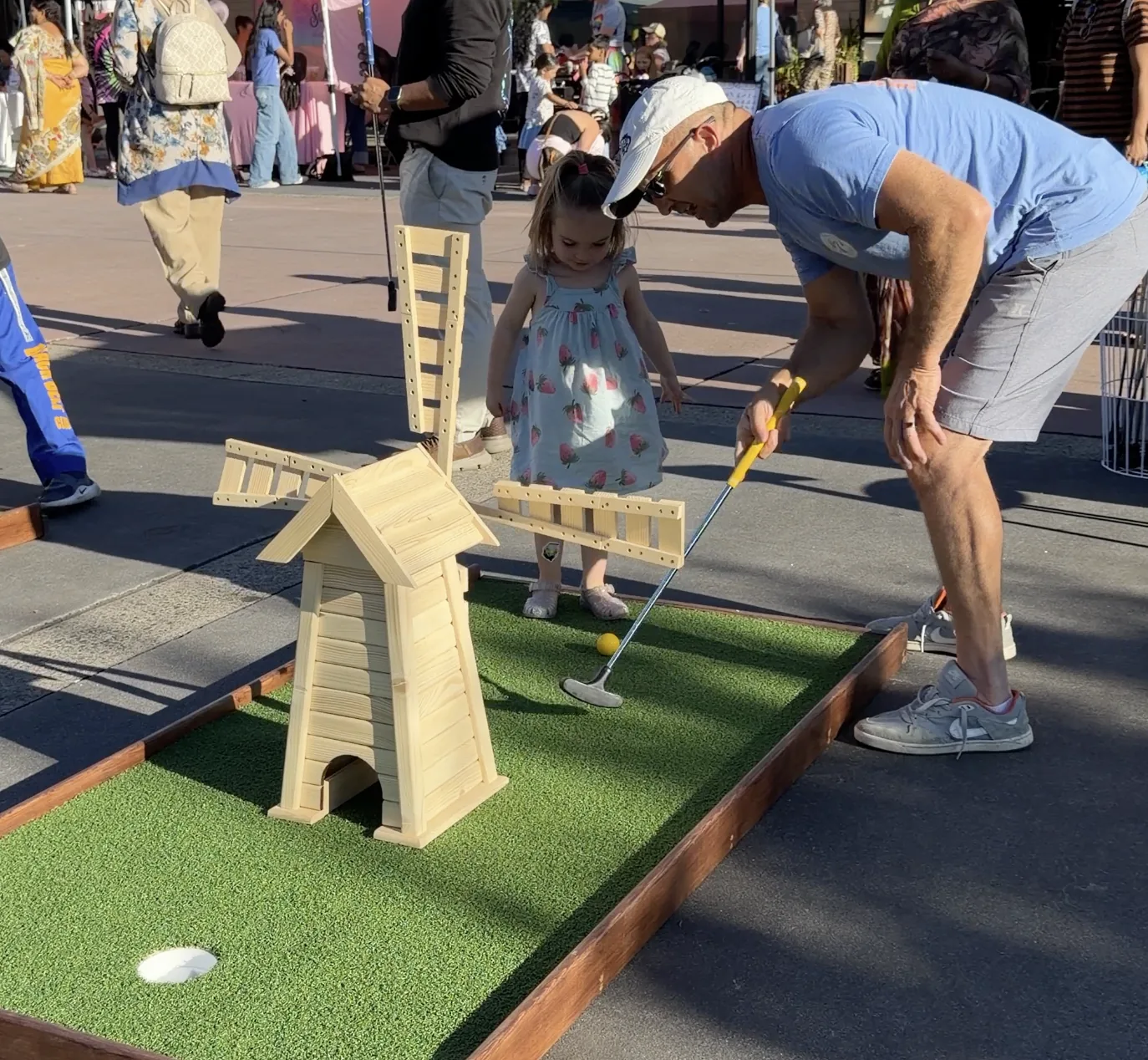 Two golf balls on grass with text: Ashley & Trevor Fore ever April 20th 2026.