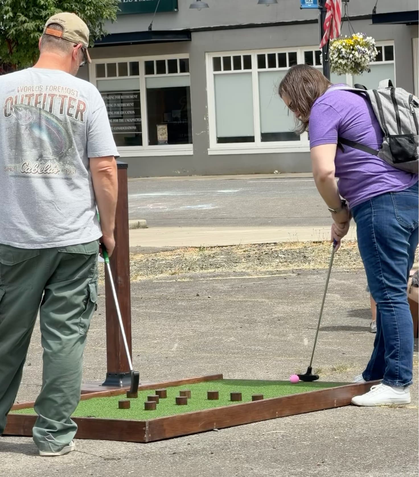 Guests playing mobile mini golf at Dallas Days
