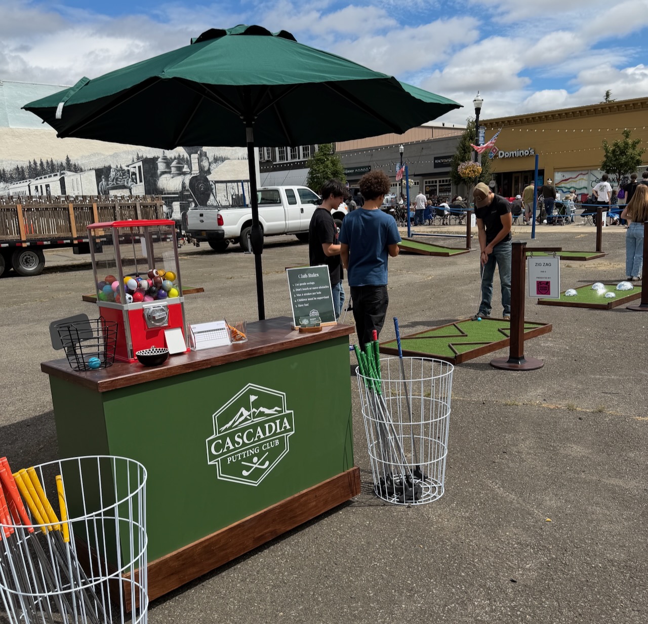 Guests playing mobile mini golf at Dallas Days