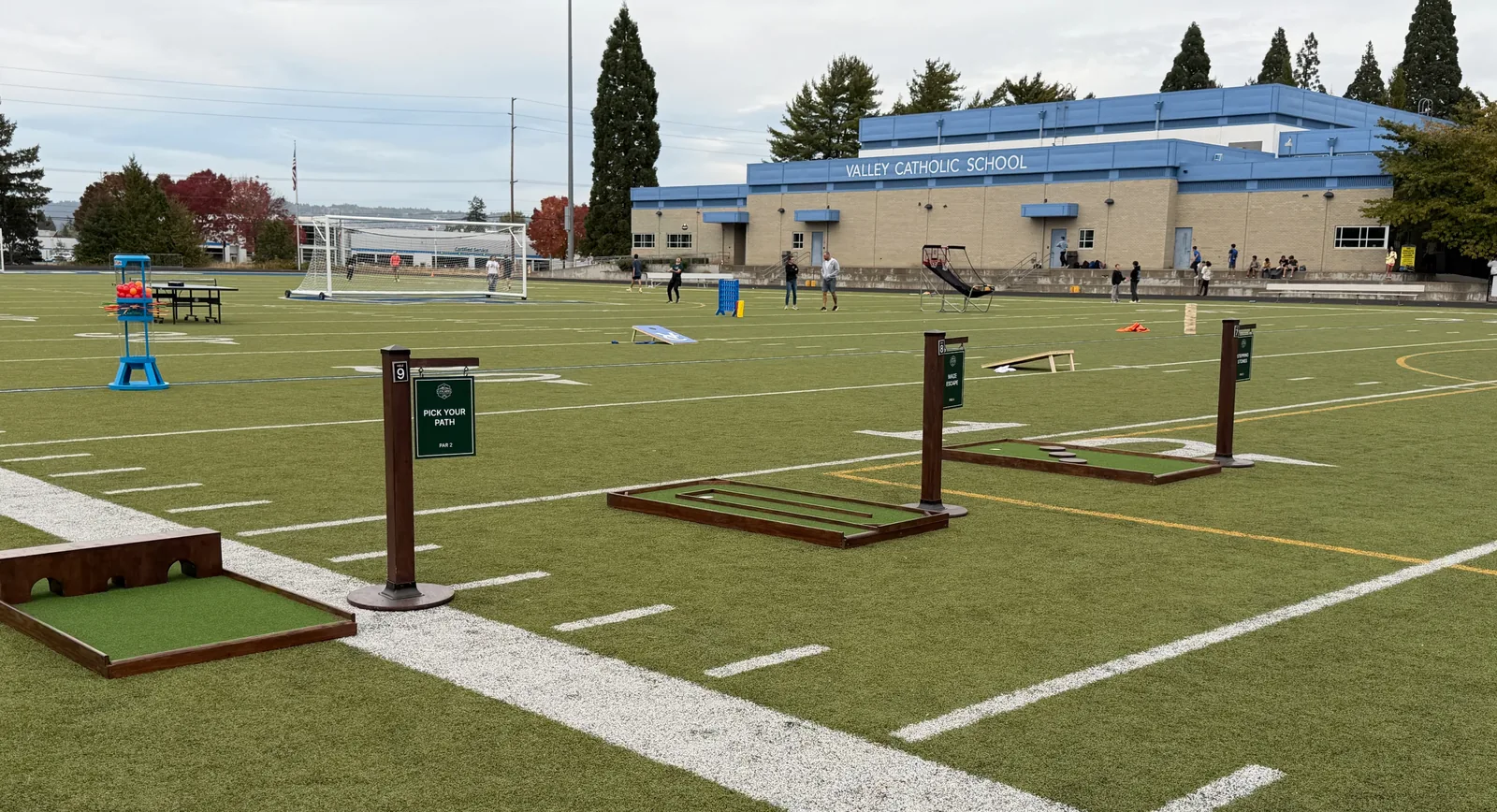 Mini golf course set up on the field for Valley Catholic's homecoming carnival