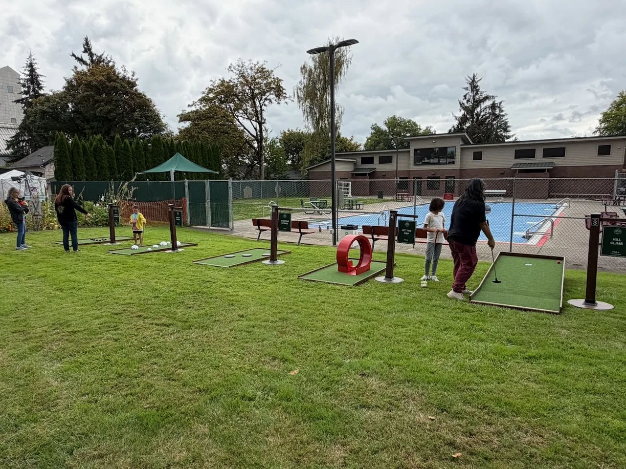 Mini golf course spread across the lawn at Carlton Crush Harvest Festival