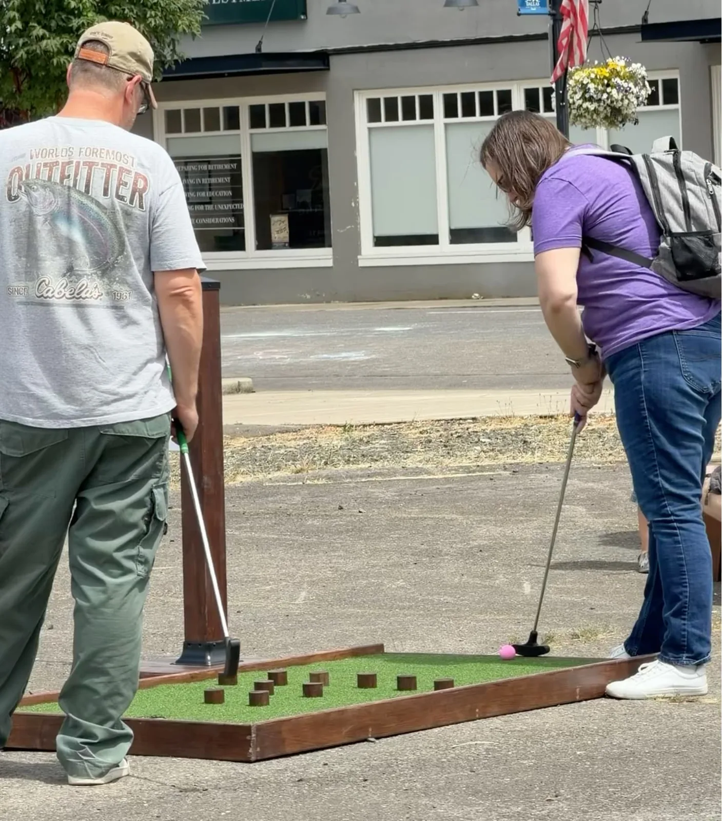 Guests playing mobile mini golf at Dallas Days