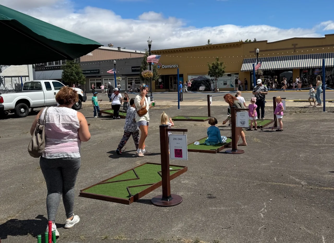 Guests playing mobile mini golf at Dallas Days