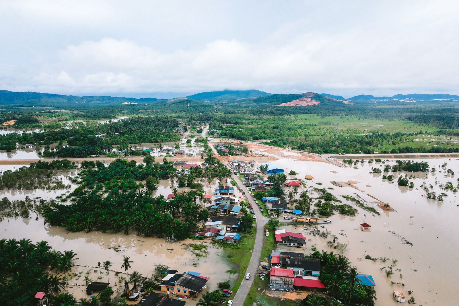 Drone view of flooding in Kijal, Terengganu, Malaysia, climate insurance
