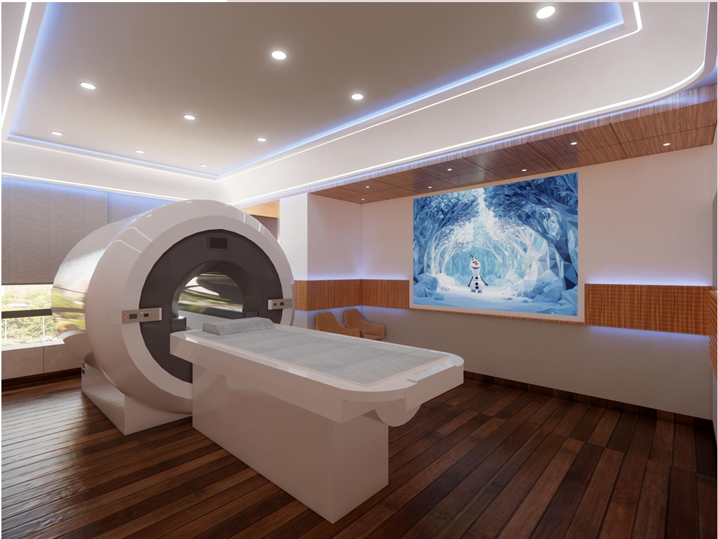 Modern MRI machine room with wood flooring, recessed ceiling lights, and a Frozen-themed wall display.