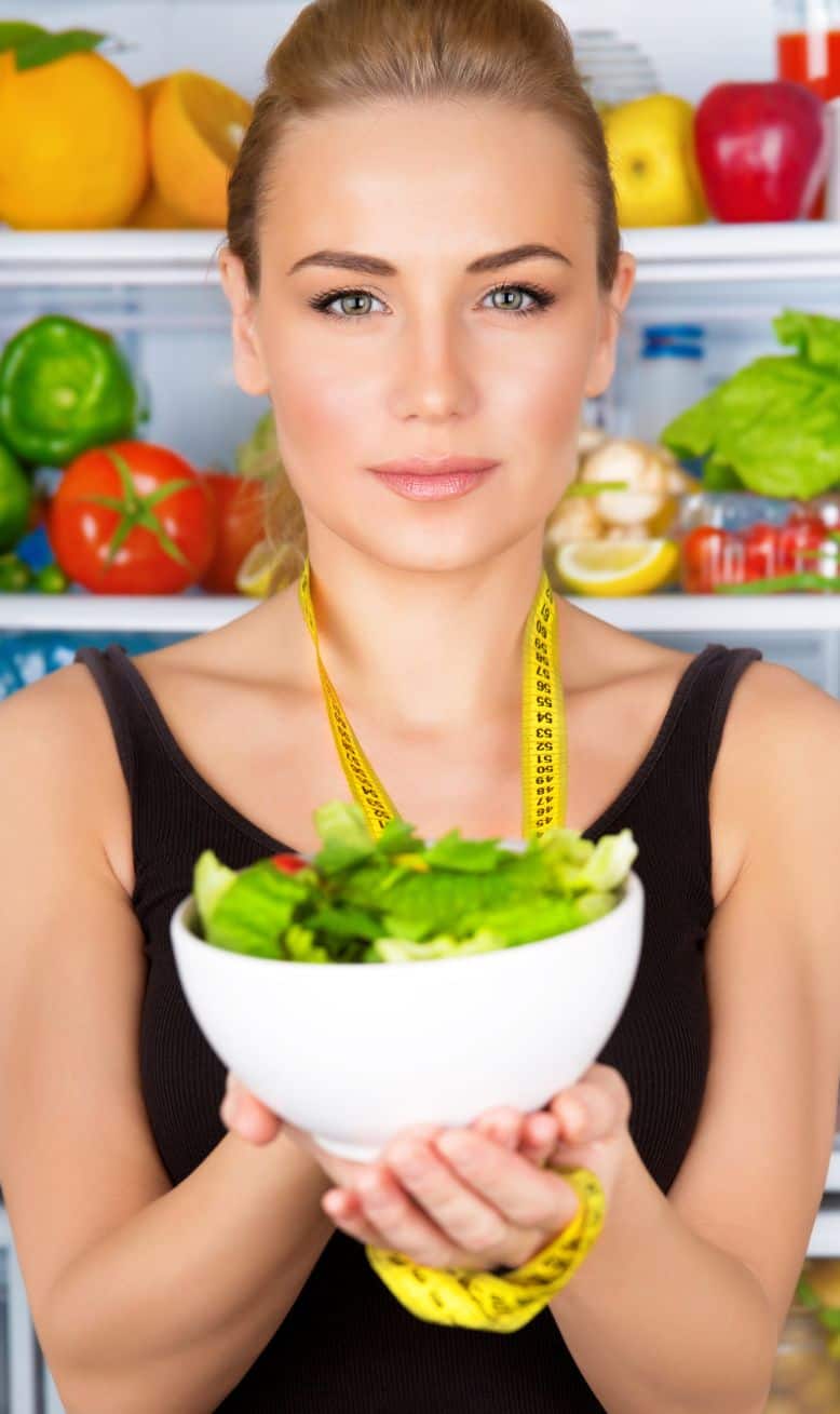 Nutritionist holding a bowl of salad