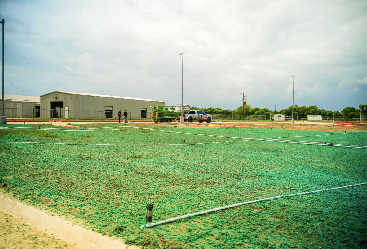 Commercial hydroseeding contractor working on a North Texas property