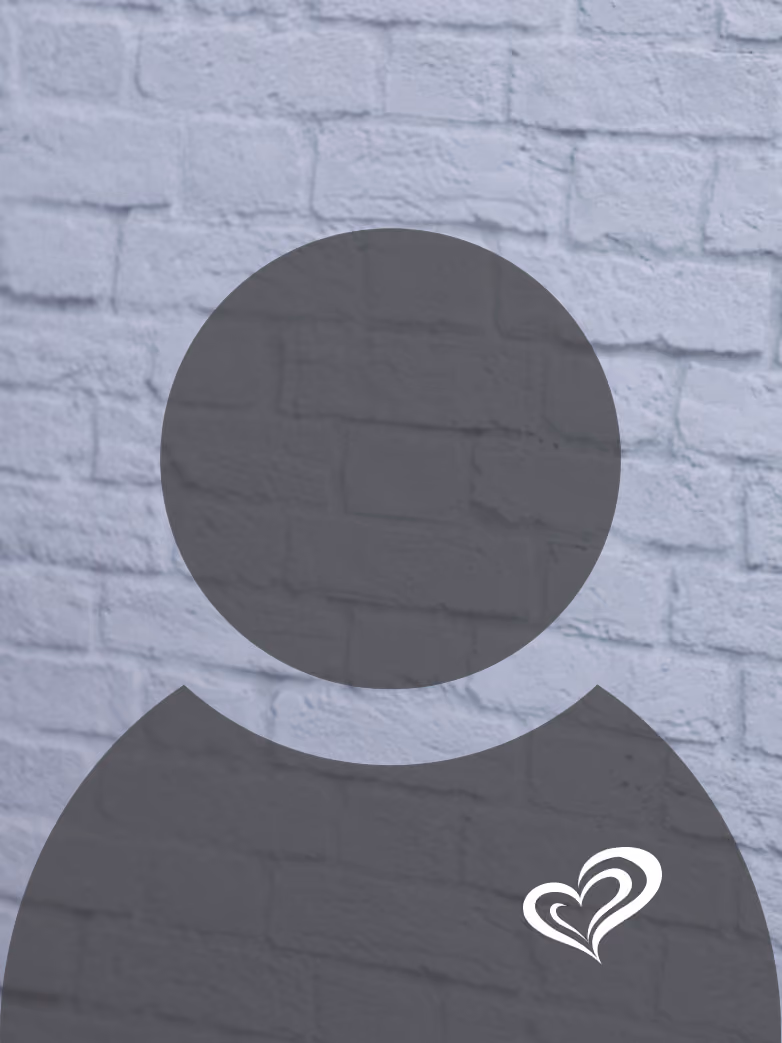 Gray silhouette of a person with a white double heart symbol on a textured gray brick wall background.