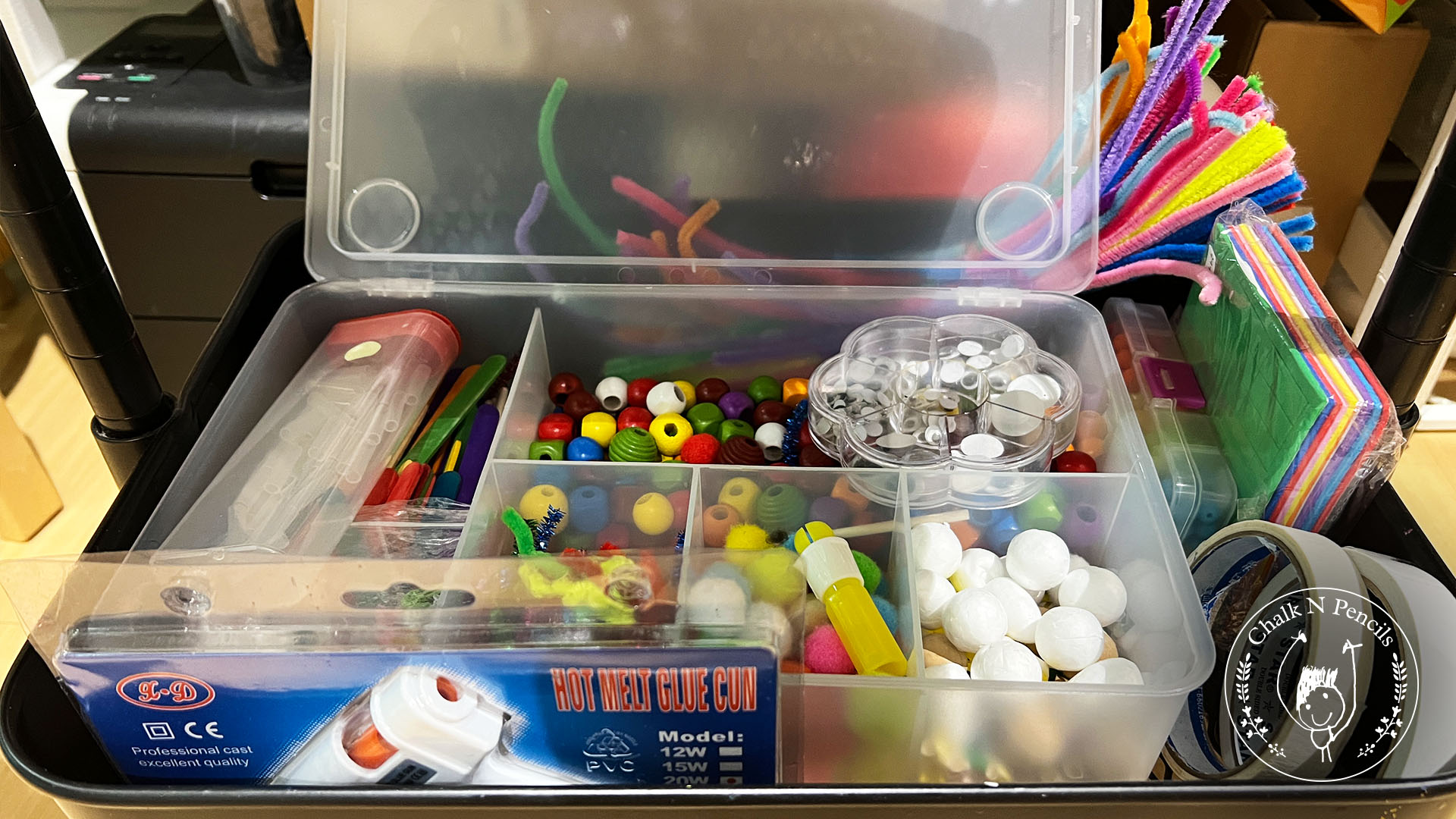 Bottom basket of the art trolley with spare paper, clay and aprons