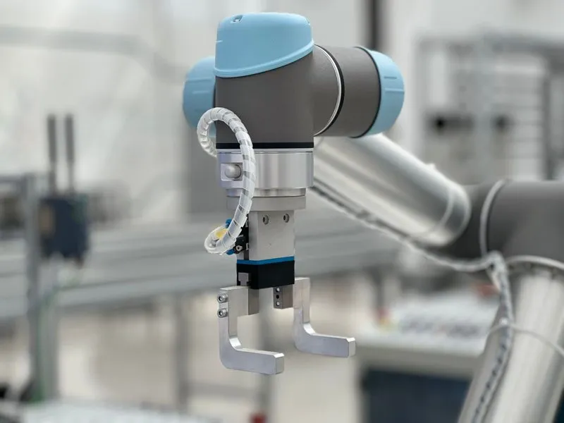 Close-up of a cobot wrist and gripper
