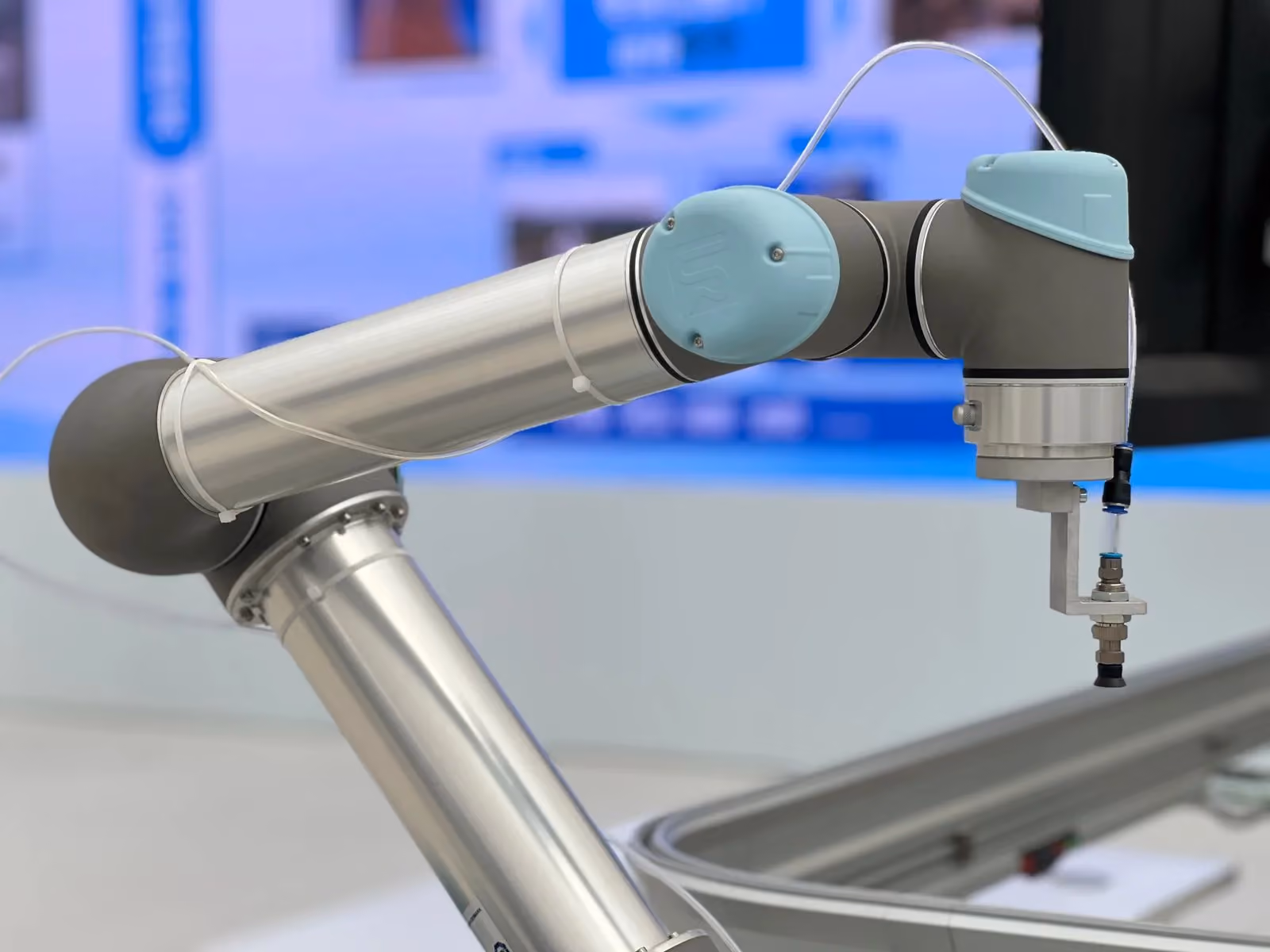 Detailed view of a robot arm's wrist joint and tool mount